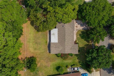 This beautifully maintained home features 4-bedrooms, 2.5-baths on Rio Pinar Golf and Country Club in Florida - for sale on GolfHomes.com, golf home, golf lot
