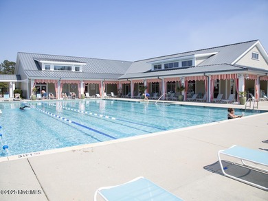 Welcome to effortless, single-level living in the highly on Cape Fear National At Brunswick Forest in North Carolina - for sale on GolfHomes.com, golf home, golf lot