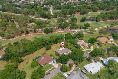 This beautifully maintained home features 4-bedrooms, 2.5-baths on Rio Pinar Golf and Country Club in Florida - for sale on GolfHomes.com, golf home, golf lot