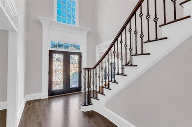 Behind the gates of Sugarloaf Country Club, this 7,000 plus sq on TPC At Sugarloaf Golf Club in Georgia - for sale on GolfHomes.com, golf home, golf lot