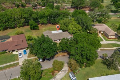 This beautifully maintained home features 4-bedrooms, 2.5-baths on Rio Pinar Golf and Country Club in Florida - for sale on GolfHomes.com, golf home, golf lot