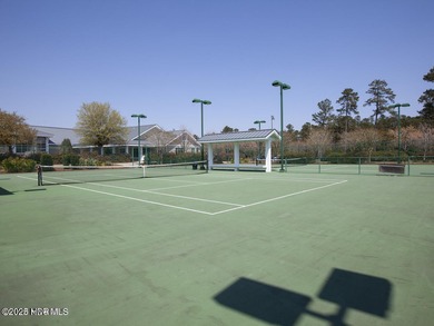Welcome to effortless, single-level living in the highly on Cape Fear National At Brunswick Forest in North Carolina - for sale on GolfHomes.com, golf home, golf lot