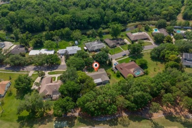 This beautifully maintained home features 4-bedrooms, 2.5-baths on Rio Pinar Golf and Country Club in Florida - for sale on GolfHomes.com, golf home, golf lot