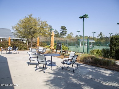 Welcome to effortless, single-level living in the highly on Cape Fear National At Brunswick Forest in North Carolina - for sale on GolfHomes.com, golf home, golf lot