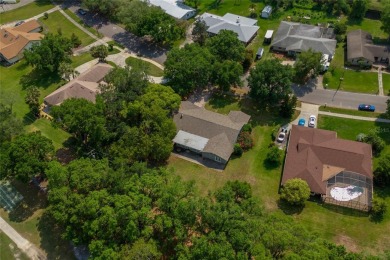 This beautifully maintained home features 4-bedrooms, 2.5-baths on Rio Pinar Golf and Country Club in Florida - for sale on GolfHomes.com, golf home, golf lot