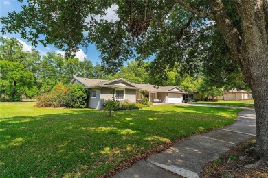 This beautifully maintained home features 4-bedrooms, 2.5-baths on Rio Pinar Golf and Country Club in Florida - for sale on GolfHomes.com, golf home, golf lot