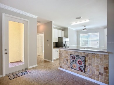 This villa was designed by GL Homes Builder as part of the very on Caloosa Greens Executive Golf Course in Florida - for sale on GolfHomes.com, golf home, golf lot
