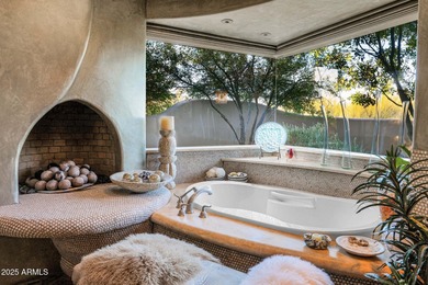 This stunning custom home, designed by renowned architect Shelby on The Boulders Resort Golf Club in Arizona - for sale on GolfHomes.com, golf home, golf lot