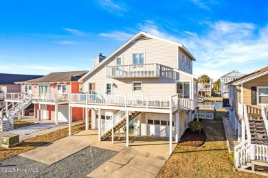 This charming beachfront cottage, located on Newport Street in on Sea Trail Golf Resort in North Carolina - for sale on GolfHomes.com, golf home, golf lot