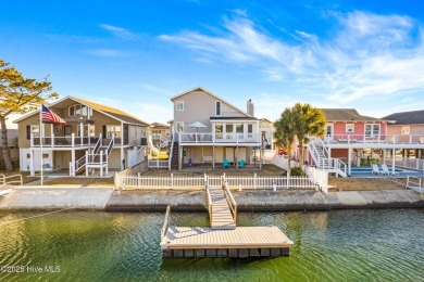 This charming beachfront cottage, located on Newport Street in on Sea Trail Golf Resort in North Carolina - for sale on GolfHomes.com, golf home, golf lot