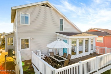 This charming beachfront cottage, located on Newport Street in on Sea Trail Golf Resort in North Carolina - for sale on GolfHomes.com, golf home, golf lot