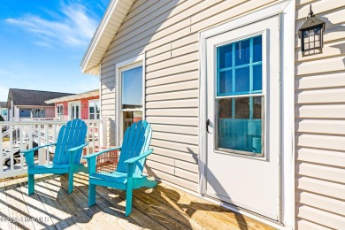 This charming beachfront cottage, located on Newport Street in on Sea Trail Golf Resort in North Carolina - for sale on GolfHomes.com, golf home, golf lot