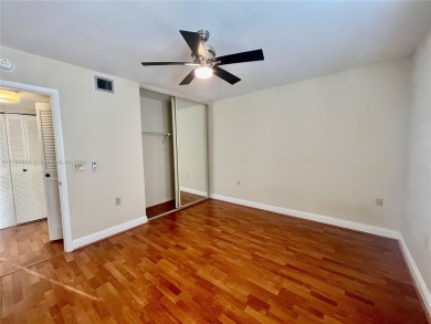 Spacious 2 bed 2 bath plus extra room! Clean & Bright unit on The Country Club At Boca Raton in Florida - for sale on GolfHomes.com, golf home, golf lot