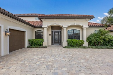 Welcome to 5569 Mulligan Way, an extraordinary two-story on Lakewood National Golf Club in Florida - for sale on GolfHomes.com, golf home, golf lot