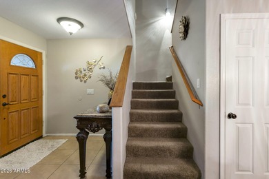 4 bedrooms,2.5 baths formal and family dining and living room on The Golf Club At Johnson Ranch in Arizona - for sale on GolfHomes.com, golf home, golf lot