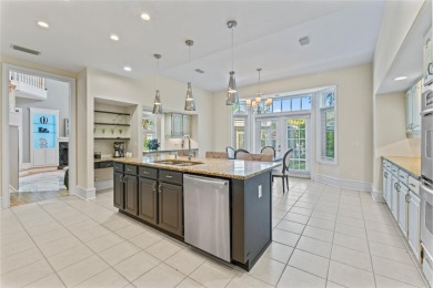 Stunning 4-Bedroom Pool Home with Office, Gazebo  Pond Views in on Tampa Palms Golf and Country Club in Florida - for sale on GolfHomes.com, golf home, golf lot