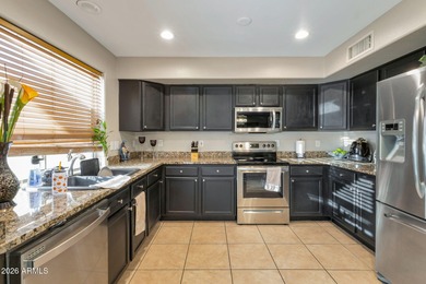 4 bedrooms,2.5 baths formal and family dining and living room on The Golf Club At Johnson Ranch in Arizona - for sale on GolfHomes.com, golf home, golf lot