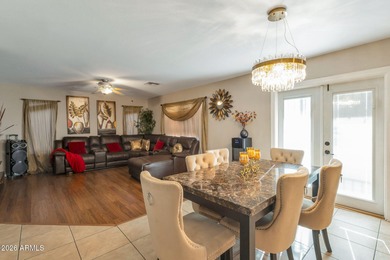 4 bedrooms,2.5 baths formal and family dining and living room on The Golf Club At Johnson Ranch in Arizona - for sale on GolfHomes.com, golf home, golf lot