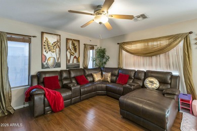 4 bedrooms,2.5 baths formal and family dining and living room on The Golf Club At Johnson Ranch in Arizona - for sale on GolfHomes.com, golf home, golf lot