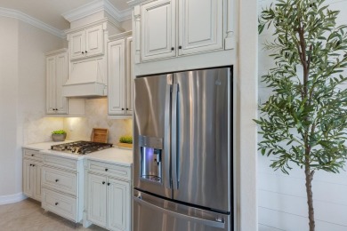 Welcome to 5569 Mulligan Way, an extraordinary two-story on Lakewood National Golf Club in Florida - for sale on GolfHomes.com, golf home, golf lot