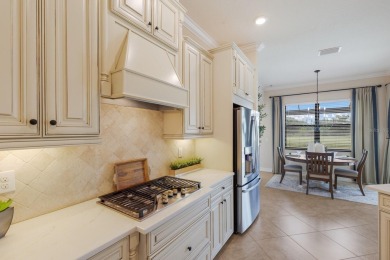 Welcome to 5569 Mulligan Way, an extraordinary two-story on Lakewood National Golf Club in Florida - for sale on GolfHomes.com, golf home, golf lot