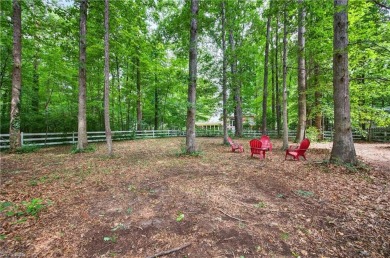 Located on quiet cul-de-sac in Sedgefield across from renowned on Sedgefield Golf Course in North Carolina - for sale on GolfHomes.com, golf home, golf lot