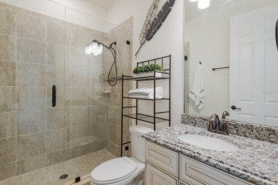 Welcome to 5569 Mulligan Way, an extraordinary two-story on Lakewood National Golf Club in Florida - for sale on GolfHomes.com, golf home, golf lot