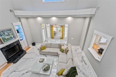 Under contract-accepting backup offers. Stunning 4-bedroom on Tampa Palms Golf and Country Club in Florida - for sale on GolfHomes.com, golf home, golf lot