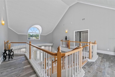 Under contract-accepting backup offers. Stunning 4-bedroom on Tampa Palms Golf and Country Club in Florida - for sale on GolfHomes.com, golf home, golf lot