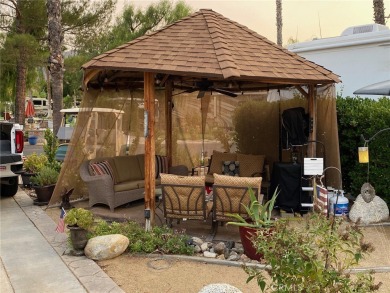 Water, Sunrise and Mountain Views are the ticket with this on Rancho California RV Resort in California - for sale on GolfHomes.com, golf home, golf lot