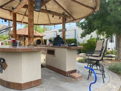 Water, Sunrise and Mountain Views are the ticket with this on Rancho California RV Resort in California - for sale on GolfHomes.com, golf home, golf lot