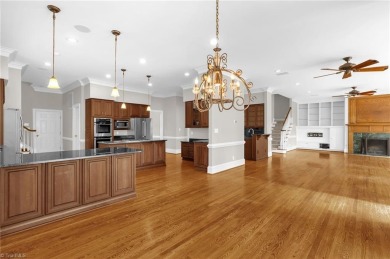 Luxury meets lifestyle in this exceptional estate located in on Sedgefield Golf Course in North Carolina - for sale on GolfHomes.com, golf home, golf lot