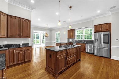 Luxury meets lifestyle in this exceptional estate located in on Sedgefield Golf Course in North Carolina - for sale on GolfHomes.com, golf home, golf lot