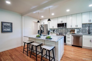 STUNNING MID-CENTURY RANCH - FULLY RENOVATED FOR MODERN LIVING! on Ruth Park Municipal Golf Course in Missouri - for sale on GolfHomes.com, golf home, golf lot