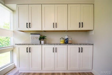 STUNNING MID-CENTURY RANCH - FULLY RENOVATED FOR MODERN LIVING! on Ruth Park Municipal Golf Course in Missouri - for sale on GolfHomes.com, golf home, golf lot