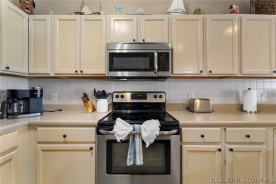 Amazing Lakefront Condo in Highly Desirable Bristol Bay! Welcome on Seasons Ridge At Four Seasons in Missouri - for sale on GolfHomes.com, golf home, golf lot