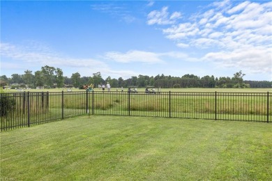 With the perfect view of the first hole at Eagle Creek Golf Club on Eagle Creek Golf Club and Grill in North Carolina - for sale on GolfHomes.com, golf home, golf lot