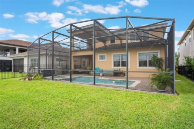 Stunning 5-Bedroom Estate on Eagle Creek Golf Course-Lake Nona on Eagle Creek Golf Club in Florida - for sale on GolfHomes.com, golf home, golf lot