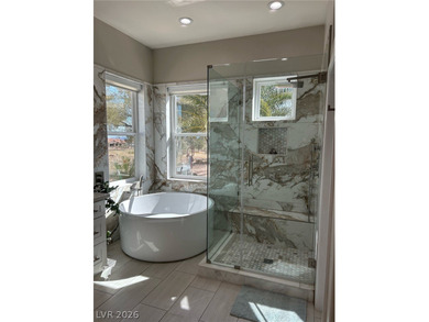 Remarkable home in the coveted Sun City Summerlin! Oversized on Highland Falls Golf Club in Nevada - for sale on GolfHomes.com, golf home, golf lot