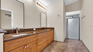 This one-of-a-kind 2,347 sq ft (2,092 + 255 sq ft BONUS ROOM) on Timber Greens Country Club in Florida - for sale on GolfHomes.com, golf home, golf lot