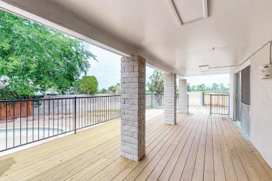 Great location right across the street from Arroyo del Oso golf on Arroyo Del Oso Golf Course in New Mexico - for sale on GolfHomes.com, golf home, golf lot