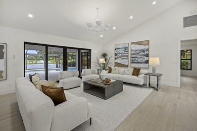 Discover refined luxury in this fully renovated 4,458 sq. ft on PGA National Golf Club in Florida - for sale on GolfHomes.com, golf home, golf lot