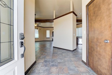 Beautiful custom dream home w/3385 sqaure feet that sits on on Cimarron National Golf Club in Oklahoma - for sale on GolfHomes.com, golf home, golf lot
