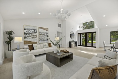 Discover refined luxury in this fully renovated 4,458 sq. ft on PGA National Golf Club in Florida - for sale on GolfHomes.com, golf home, golf lot