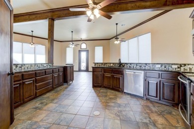 Beautiful custom dream home w/3385 sqaure feet that sits on on Cimarron National Golf Club in Oklahoma - for sale on GolfHomes.com, golf home, golf lot