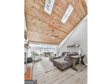 Wake up to breathtaking lake views, glowing sunrises, and on The Highlands Course at Lake Arrowhead in Georgia - for sale on GolfHomes.com, golf home, golf lot