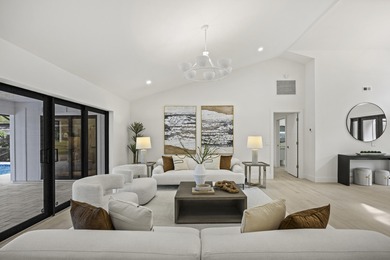 Discover refined luxury in this fully renovated 4,458 sq. ft on PGA National Golf Club in Florida - for sale on GolfHomes.com, golf home, golf lot