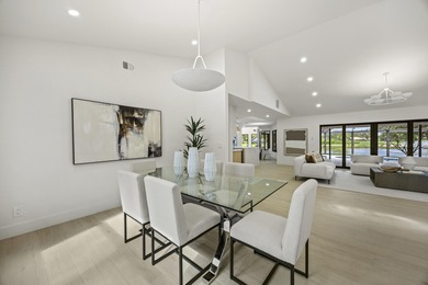 Discover refined luxury in this fully renovated 4,458 sq. ft on PGA National Golf Club in Florida - for sale on GolfHomes.com, golf home, golf lot