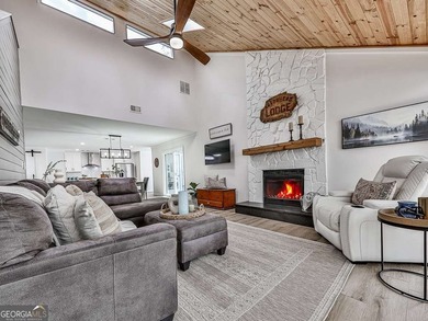 Wake up to breathtaking lake views, glowing sunrises, and on The Highlands Course at Lake Arrowhead in Georgia - for sale on GolfHomes.com, golf home, golf lot