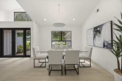 Discover refined luxury in this fully renovated 4,458 sq. ft on PGA National Golf Club in Florida - for sale on GolfHomes.com, golf home, golf lot